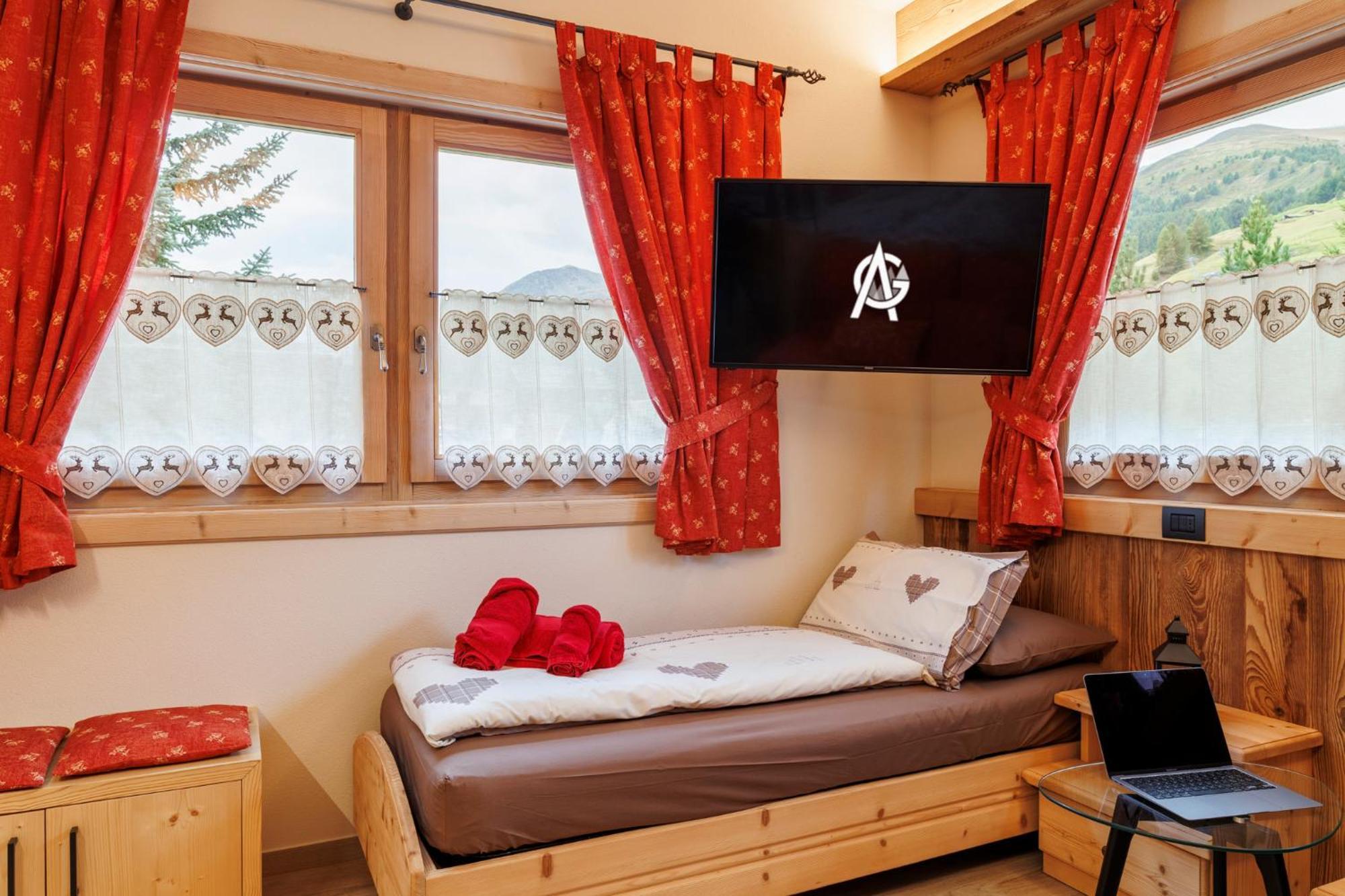 Ag Apartments Livigno Centro Szoba fotó